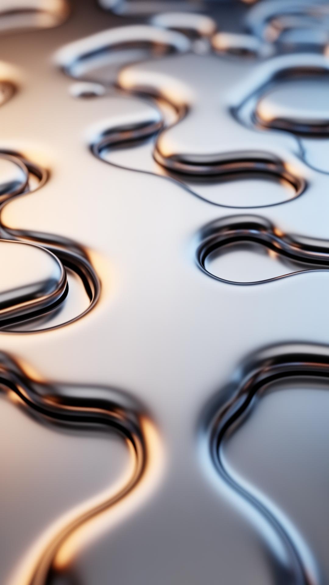 Reflective chrome shapes representing an evolving pattern